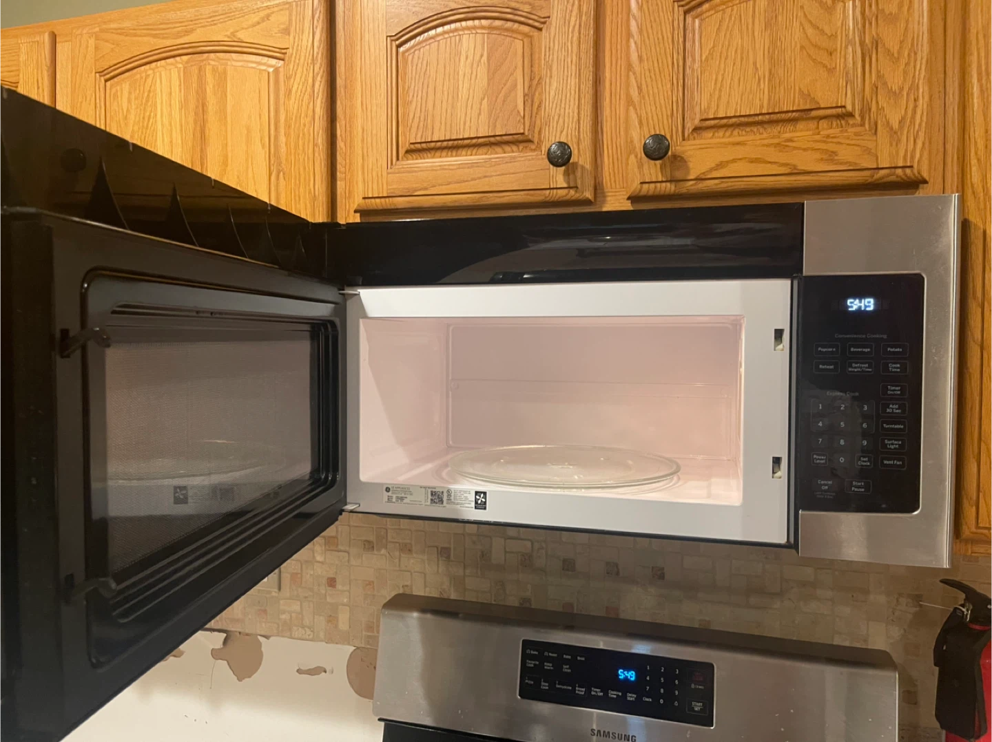 GE Over-the-Range Microwave - photo 3