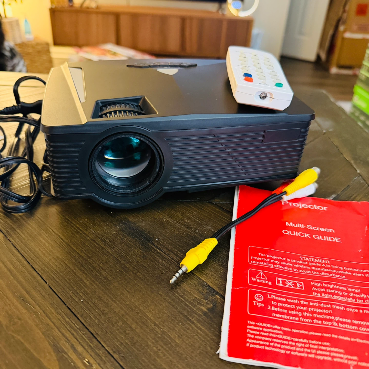 Projector with Remote and Quick Guide.