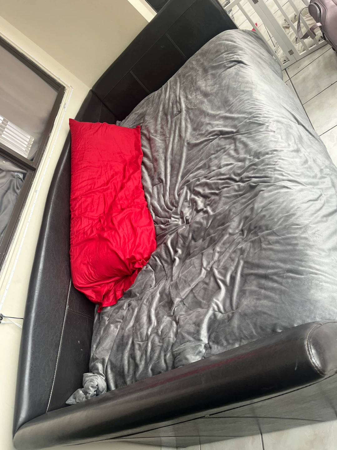 Black Faux Leather Bed Frame with Grey Bedding