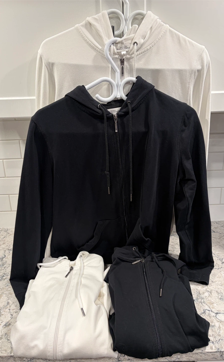 Women’s Black and White Zip Up Hoodie/Sweaters ($10 each)