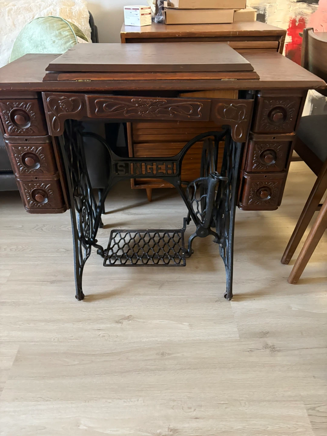 Antique Singer Sewing Machine Cabinet with Ornate Details