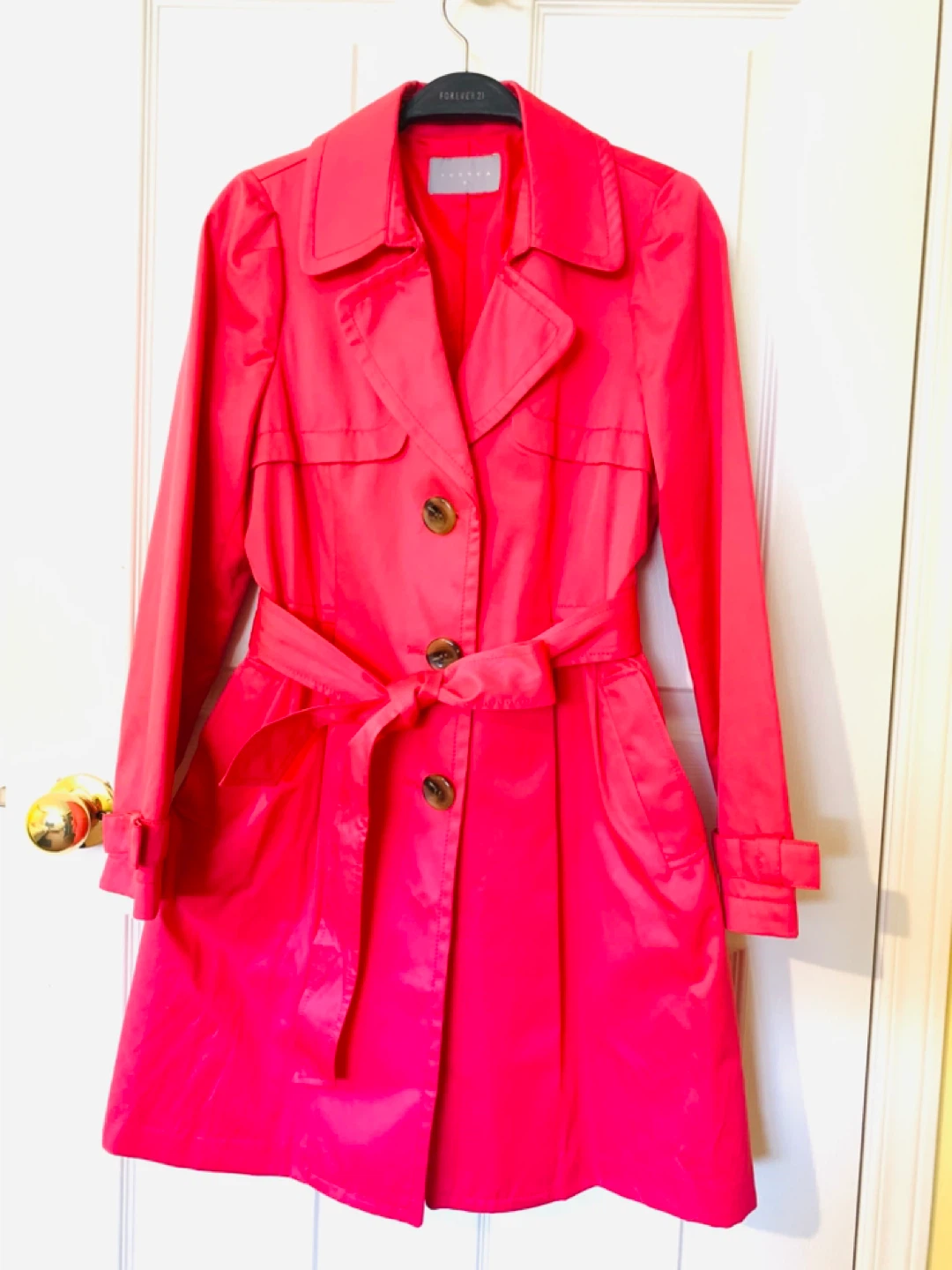 A feminine pink coat, size M