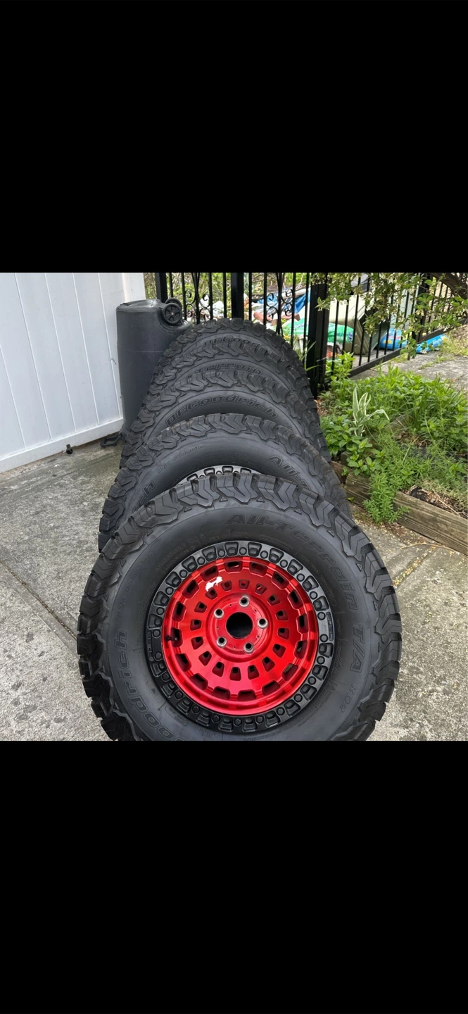 BFGoodrich 33x12.50R17LT Tires with Red Rims (Set of 5)