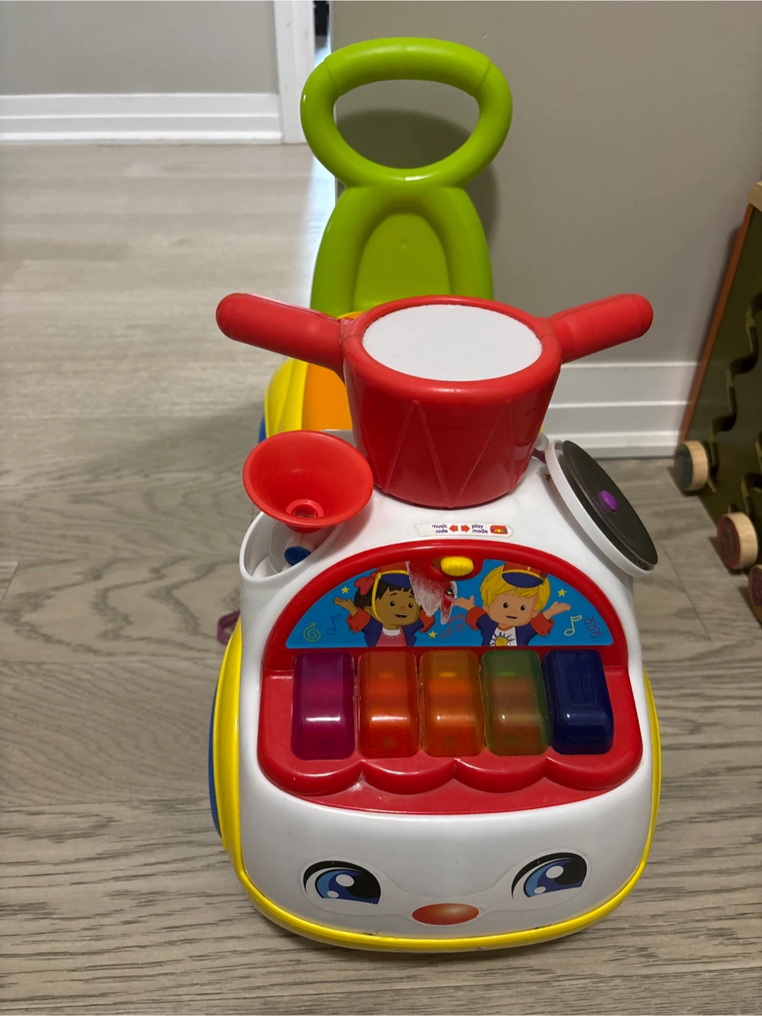 Fisher-Price Little People Music Parade Ride-On Toy