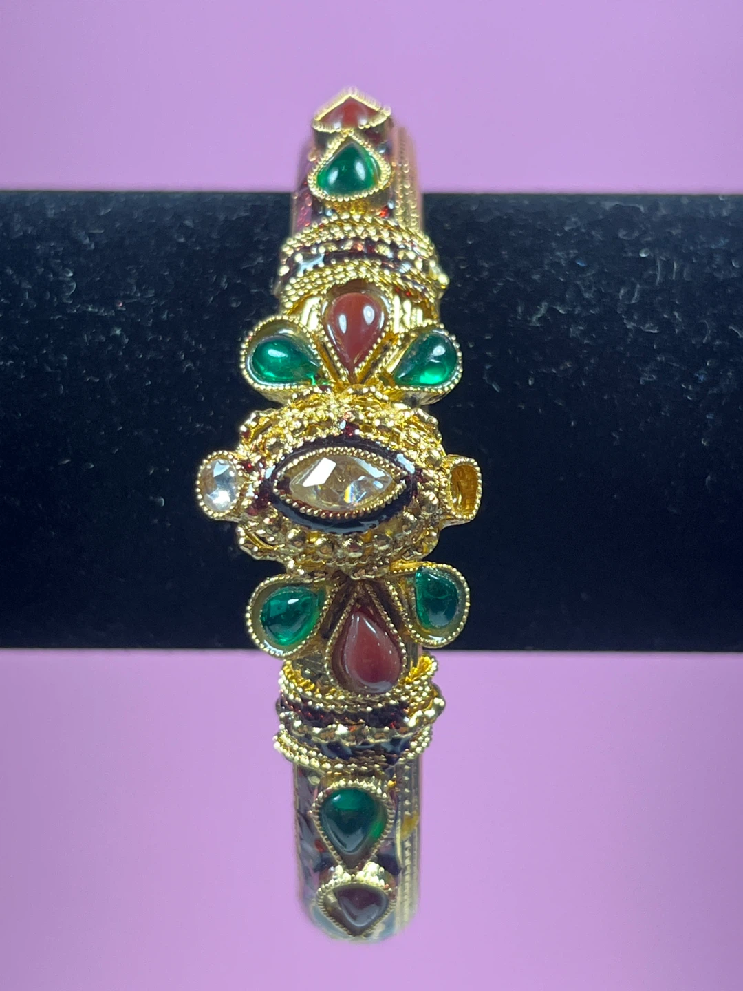 Gold Tone Bracelet with Red and Green Stones