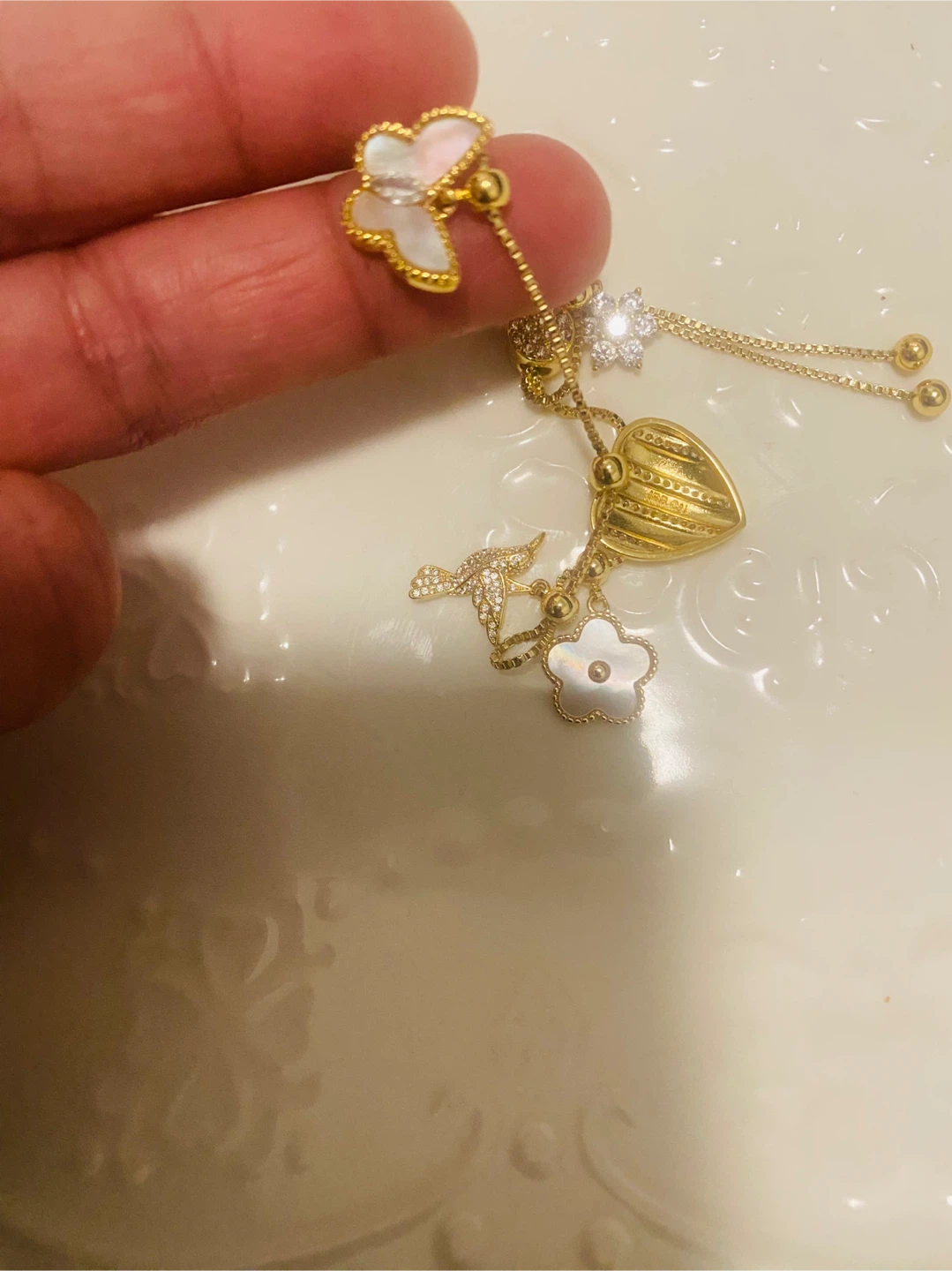 New / unused Gold color Necklace with Charms - photo 4