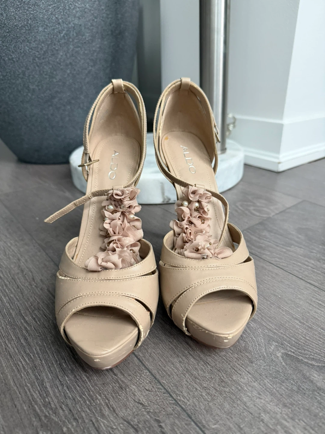 ALDO beige heels with floral embellishments