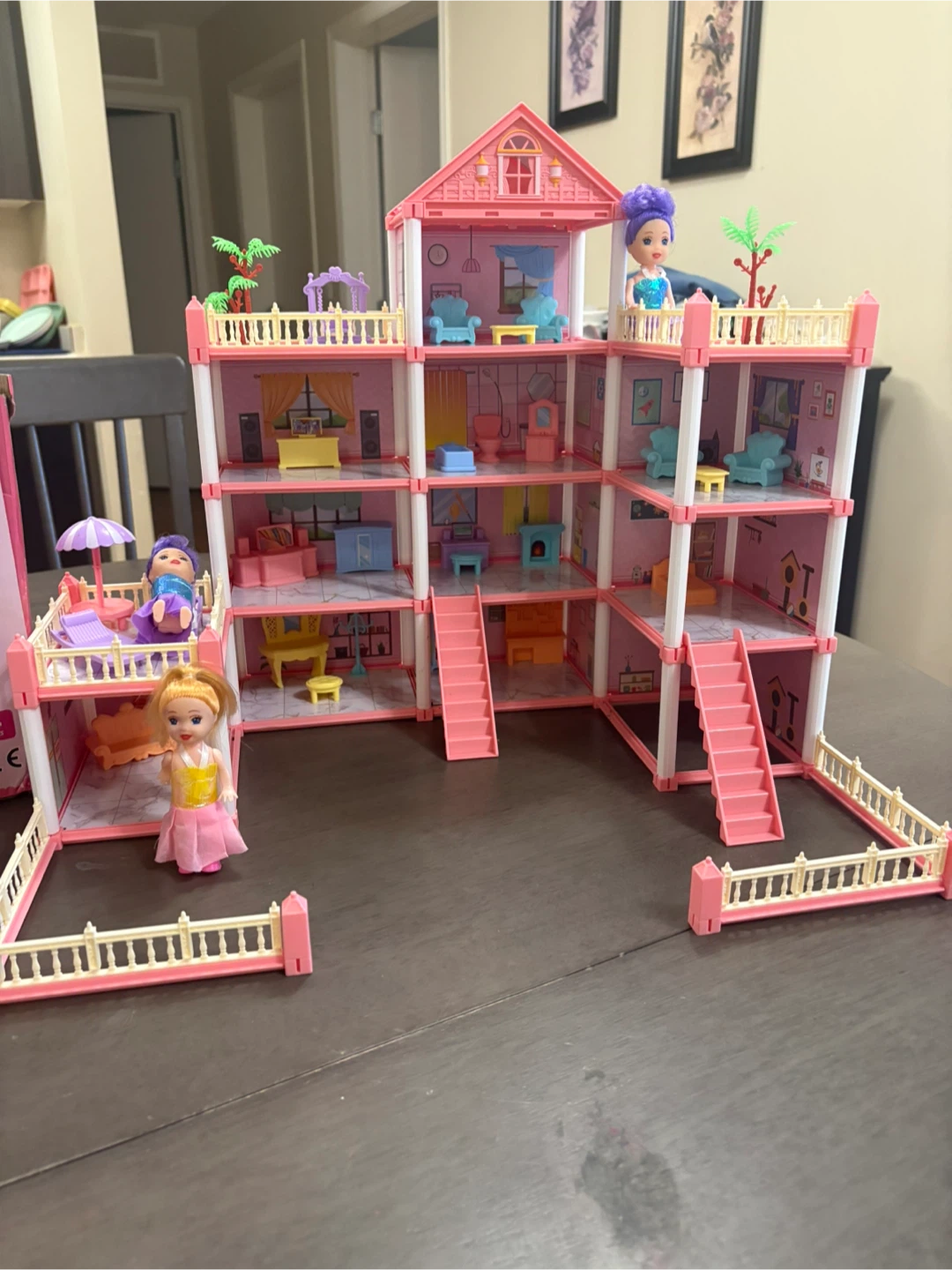 Pink Dollhouse with Furniture and Dolls