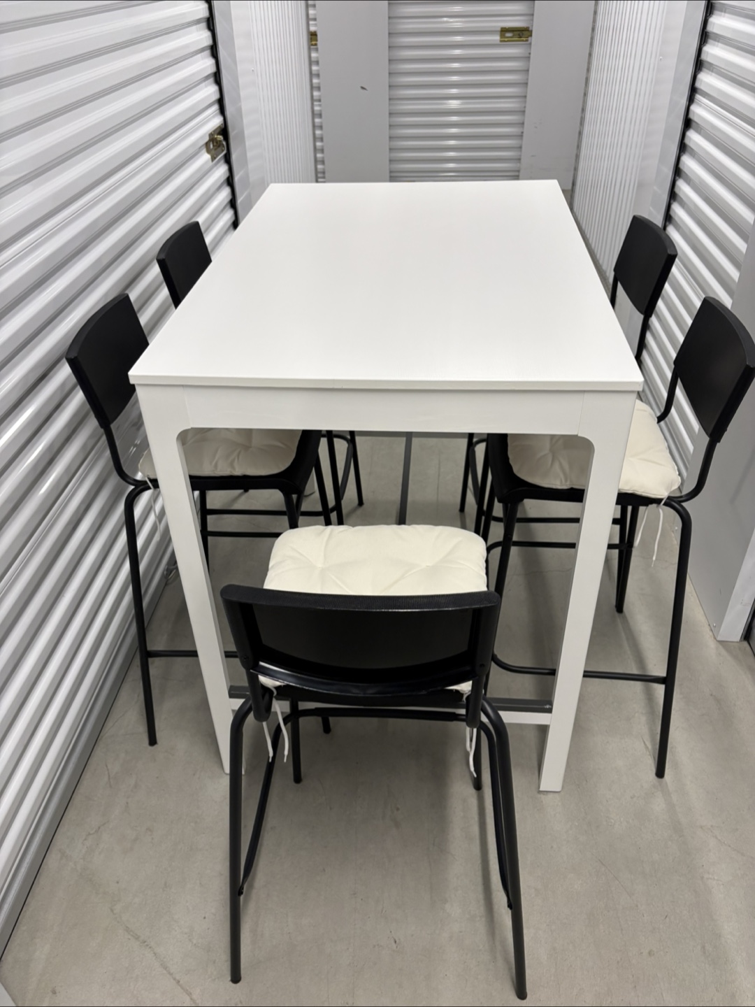 Can deliver—White bar table and 5 black bar chairs. - photo 3