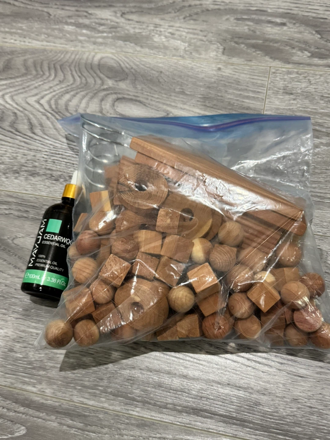 Cedarwood Essential Oil and Wood Pieces