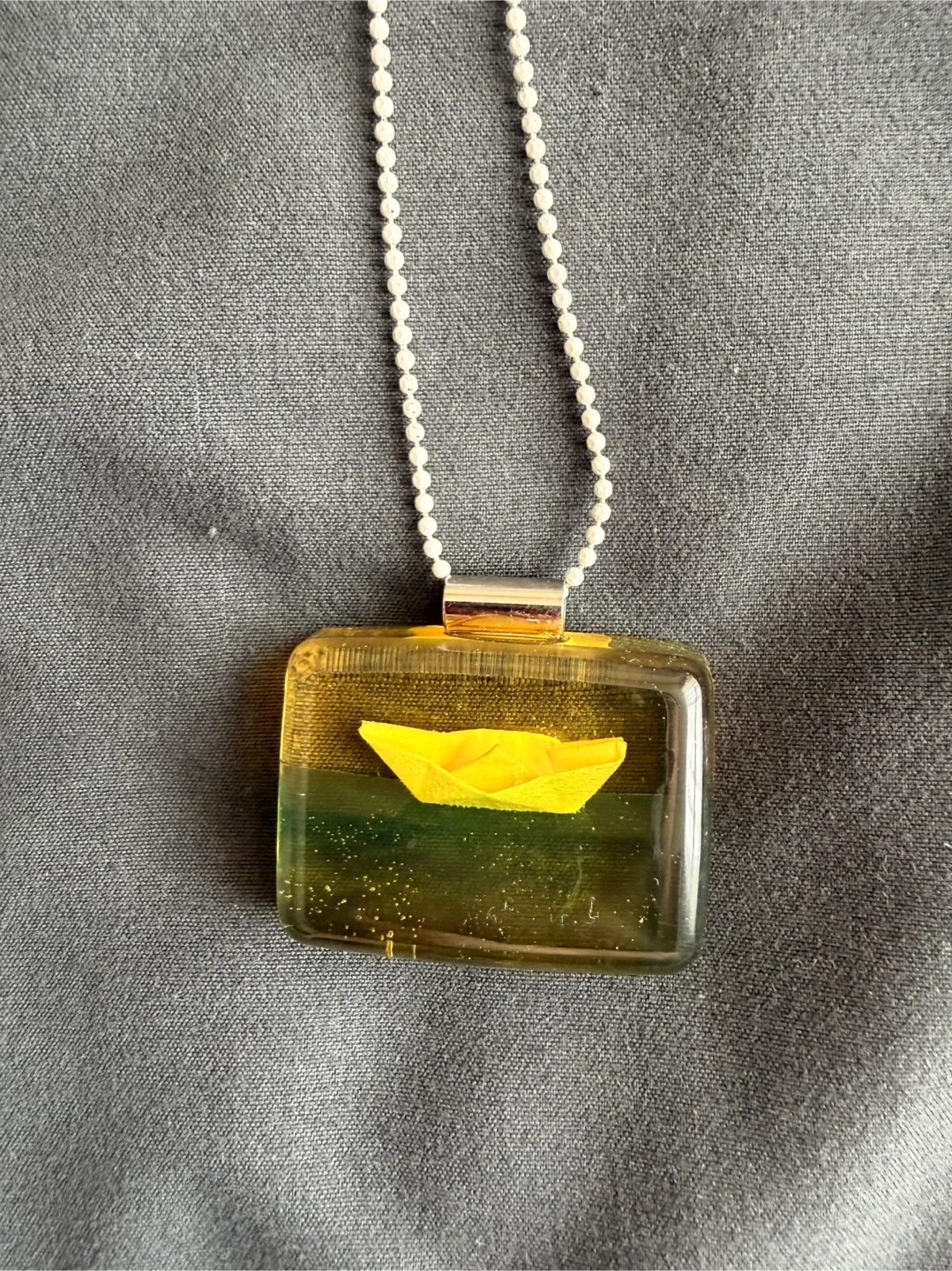 Handmade Resin Pendant Necklace with Yellow Paper Boat