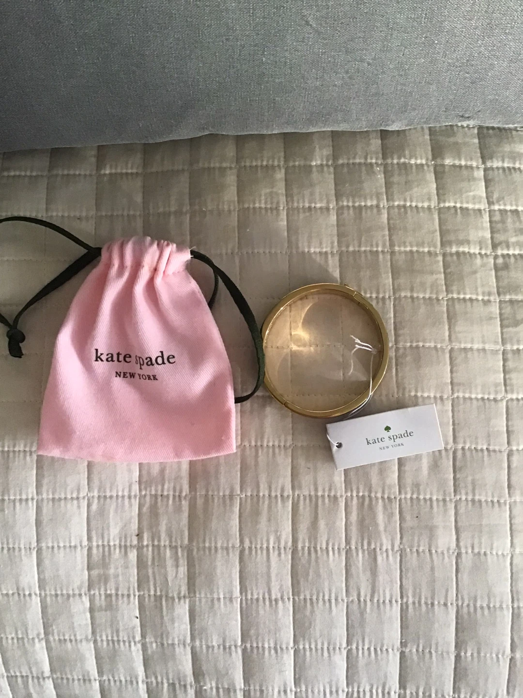 Kate Spade New York Gold Tone Bangle Bracelet with Black Enamel