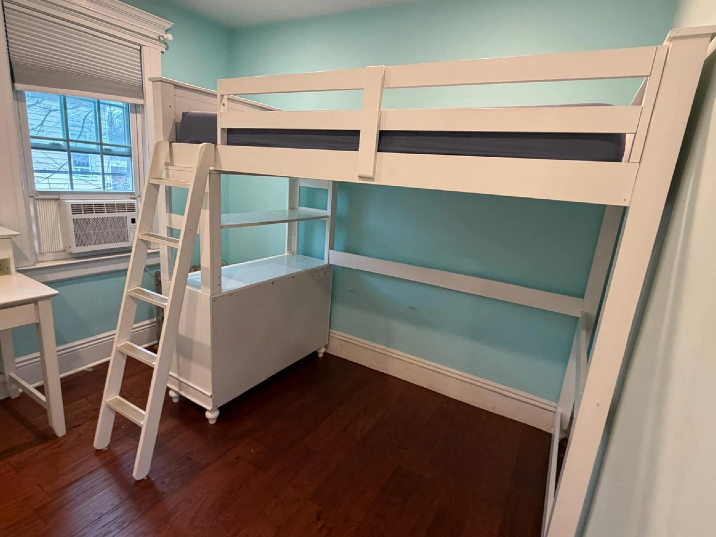 White Loft Bed with Drawers and Shelves and a desk
