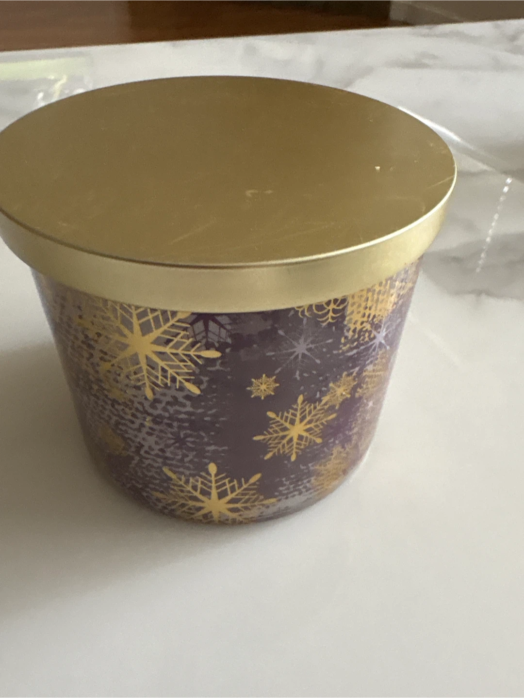 Decorative Candle with Gold Snowflake Design