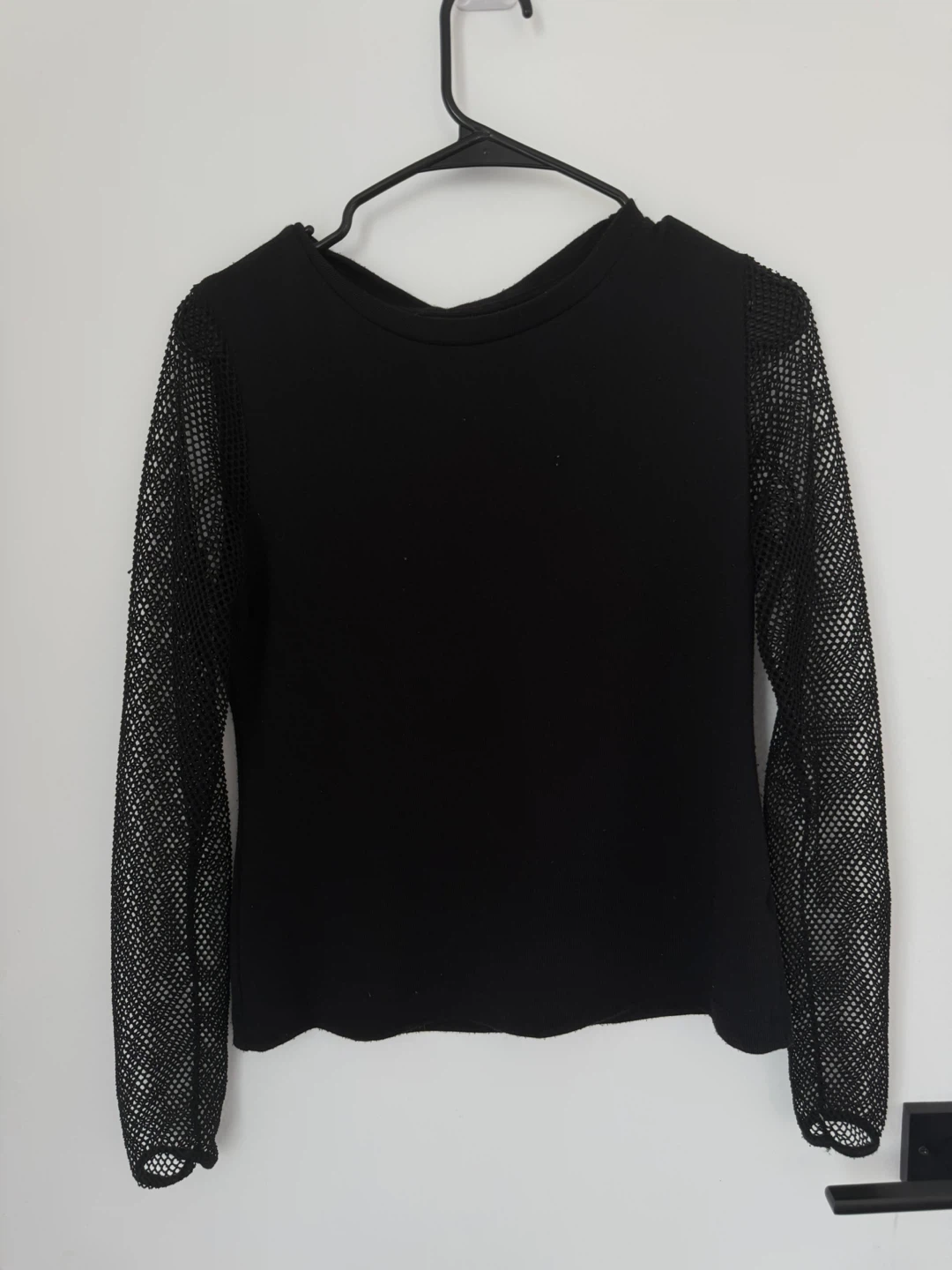 Black long sleeve top with mesh sleeves