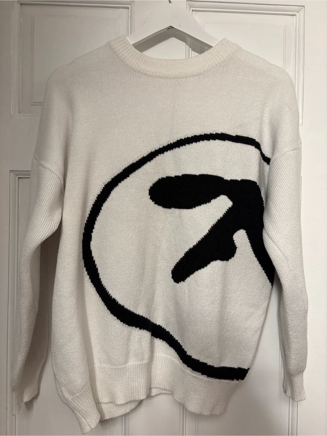 White Knit Sweater with Black Graphic