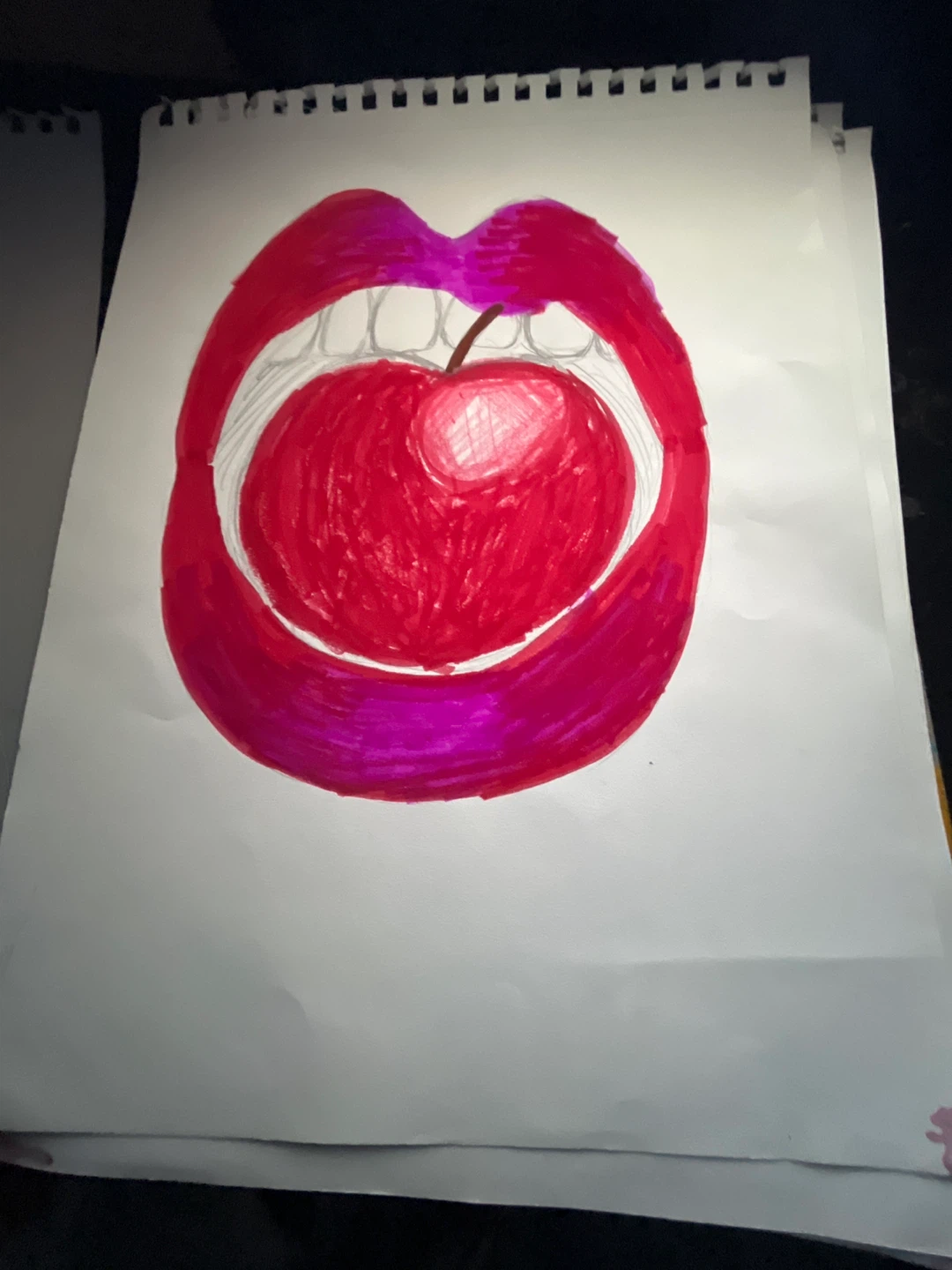 Drawing of lips with an apple