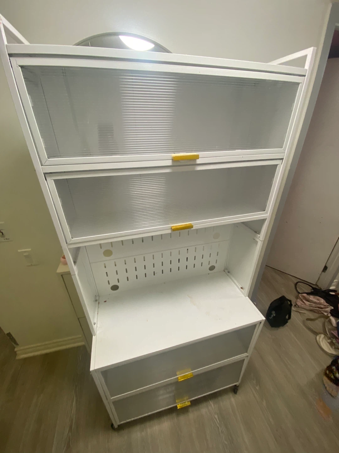 White Multi-Tiered Storage Shelf with Doors