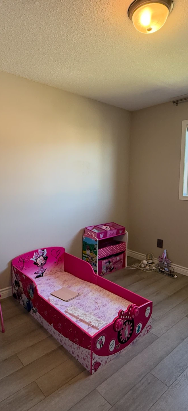 Kids Minnie Mouse Toddler Bed and Shelving unit.