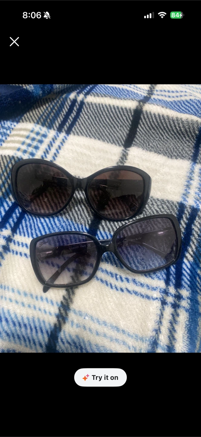 Two pairs of Gucci sunglasses
