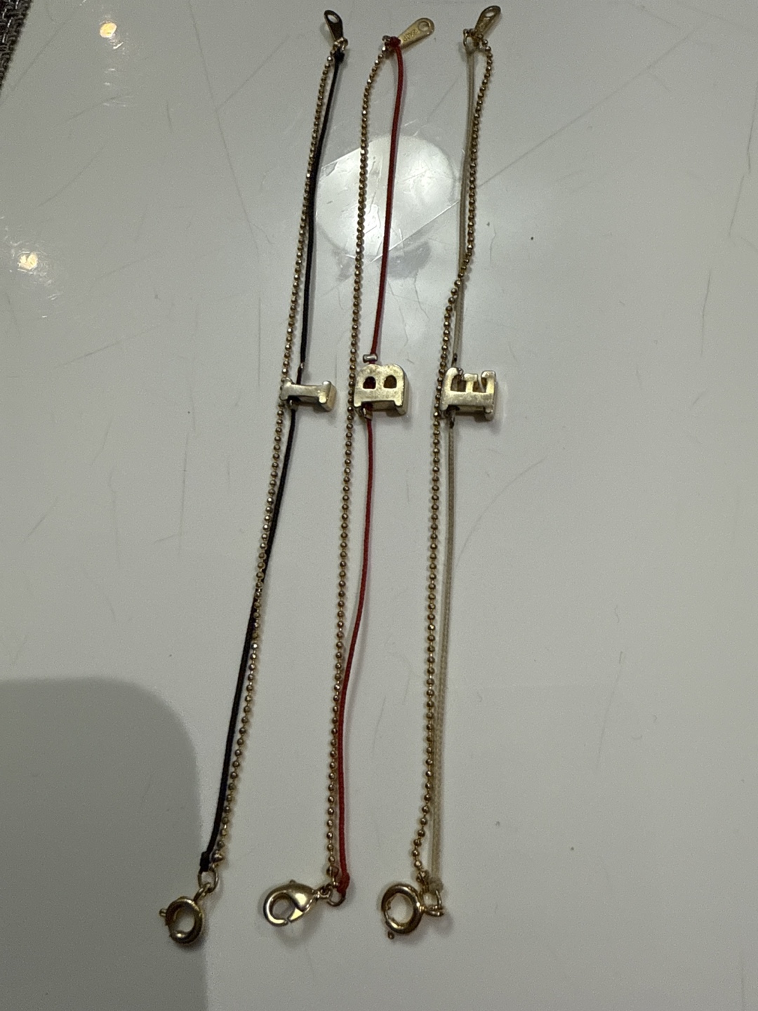 3 Gold Tone Charm Bracelets - 'I”,B', 'E'