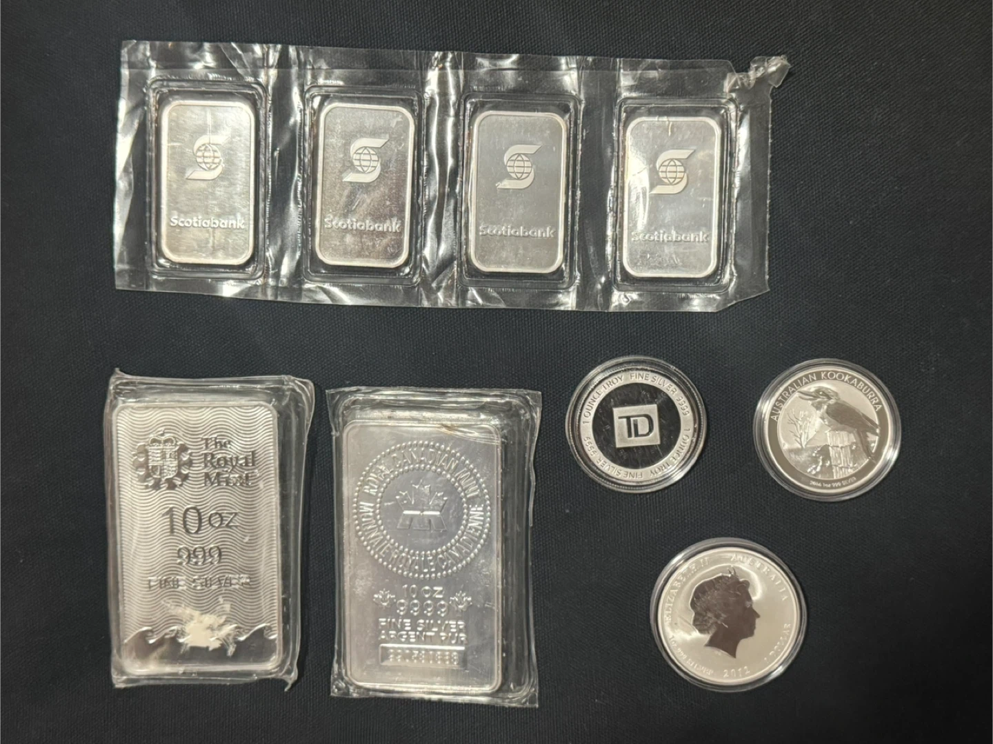 Assorted Silver Bars and Coins