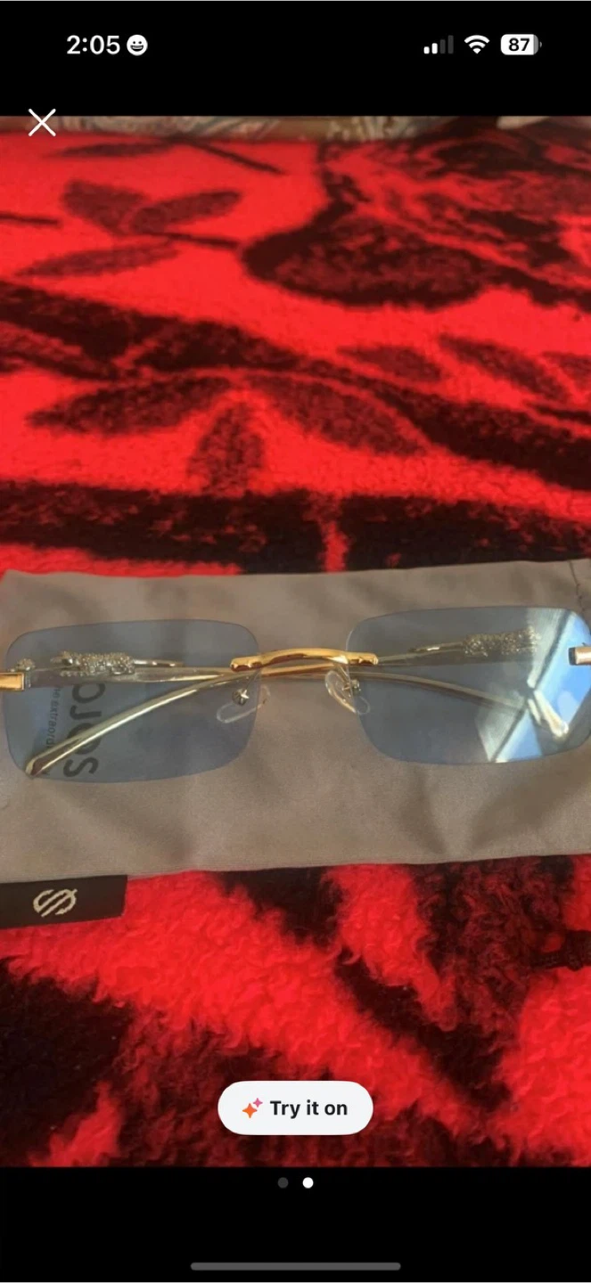 Rimless Blue Lens Sunglasses with Gold Accents