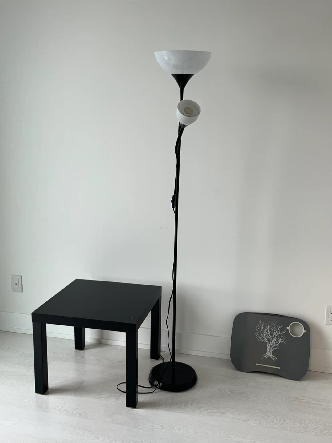 Ikea Black Dual-Head Floor Lamp and coffee table