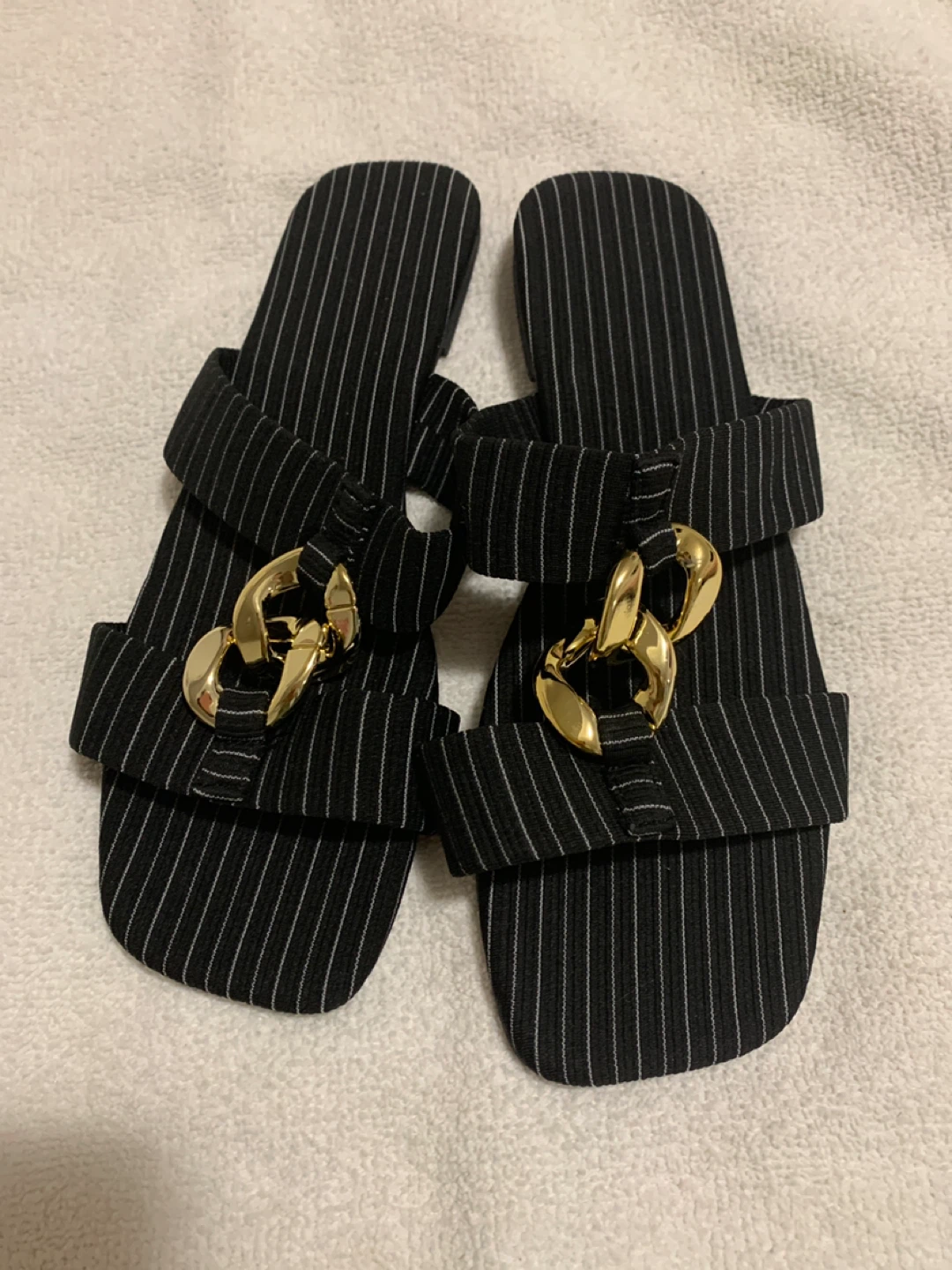 Black Pinstripe Sandals with Gold Chain Accent