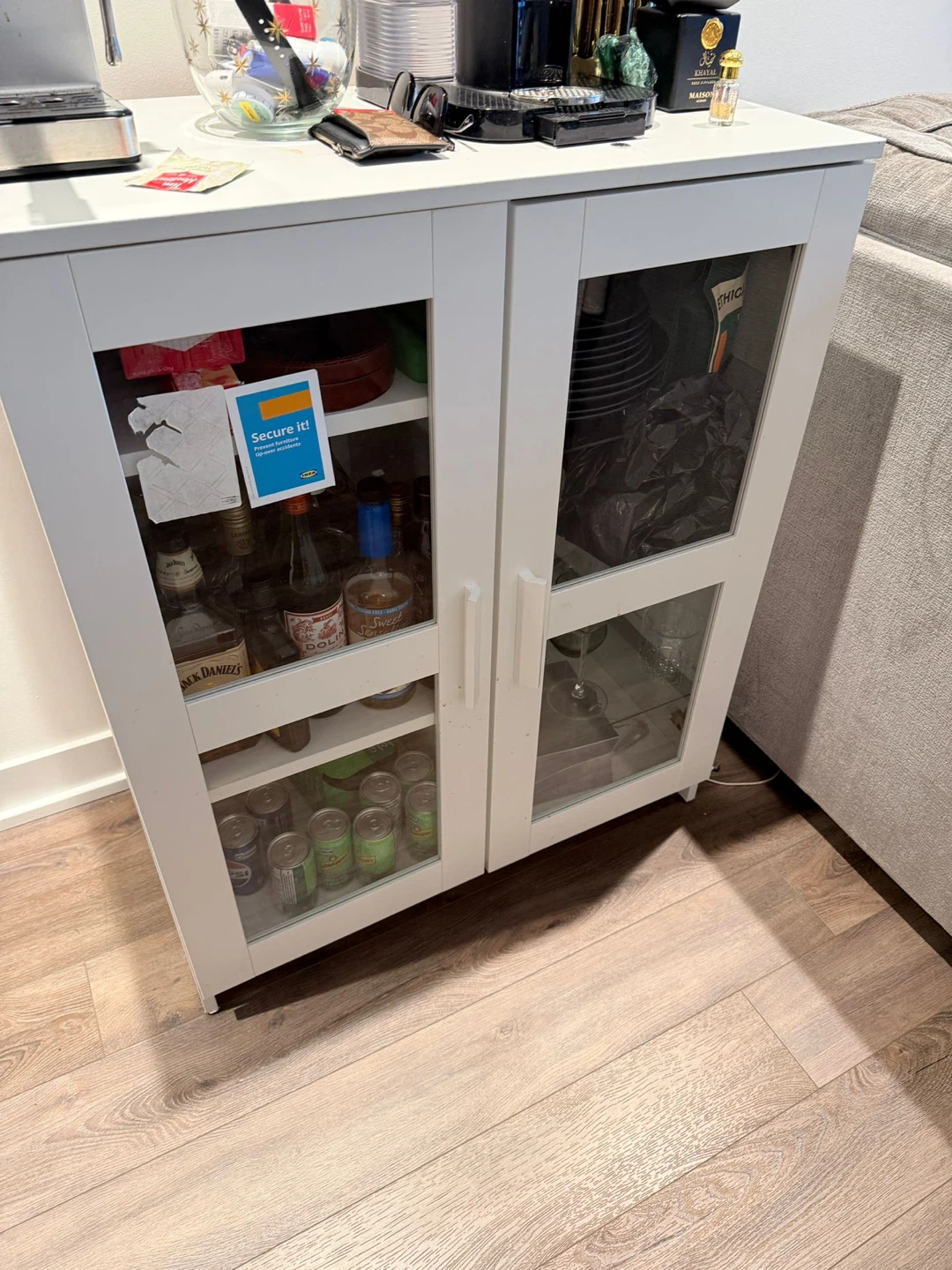 IKEA White Two-Door Cabinet with Glass Panes