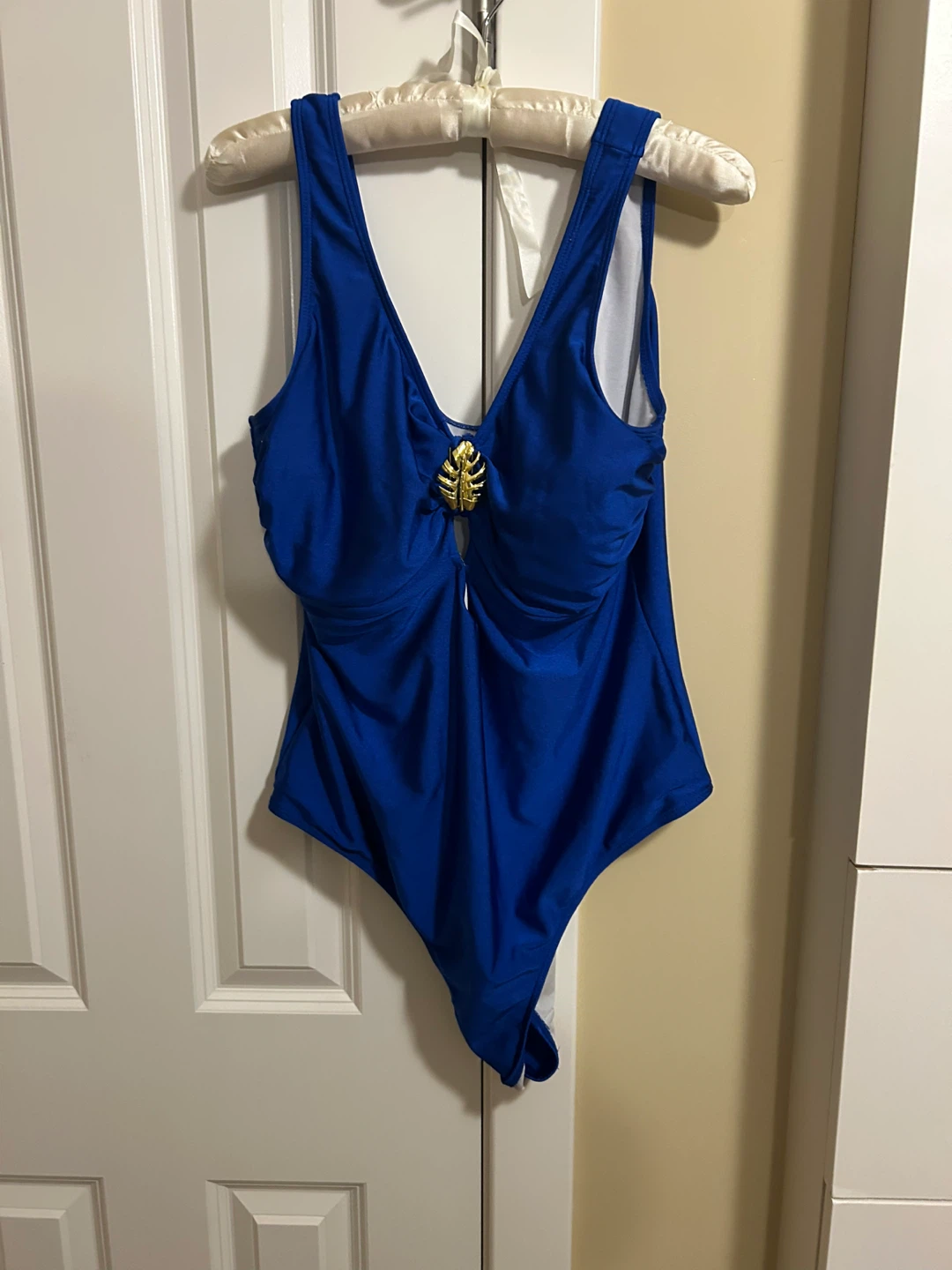 Blue One-Piece Swimsuit with Gold Leaf Accent