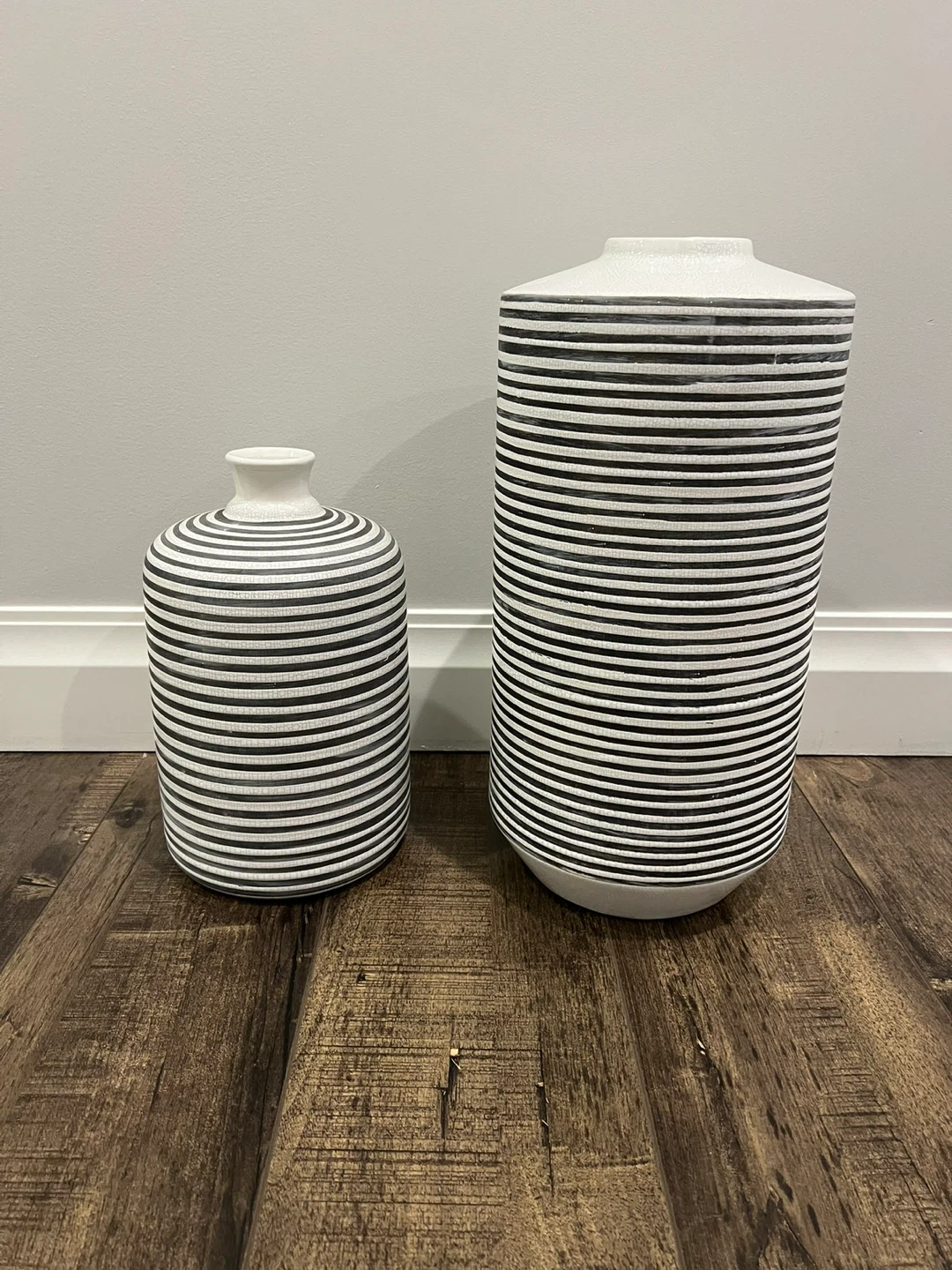Two striped ceramic vases