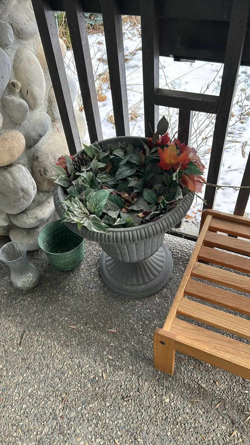 Urn planter with faux foliage