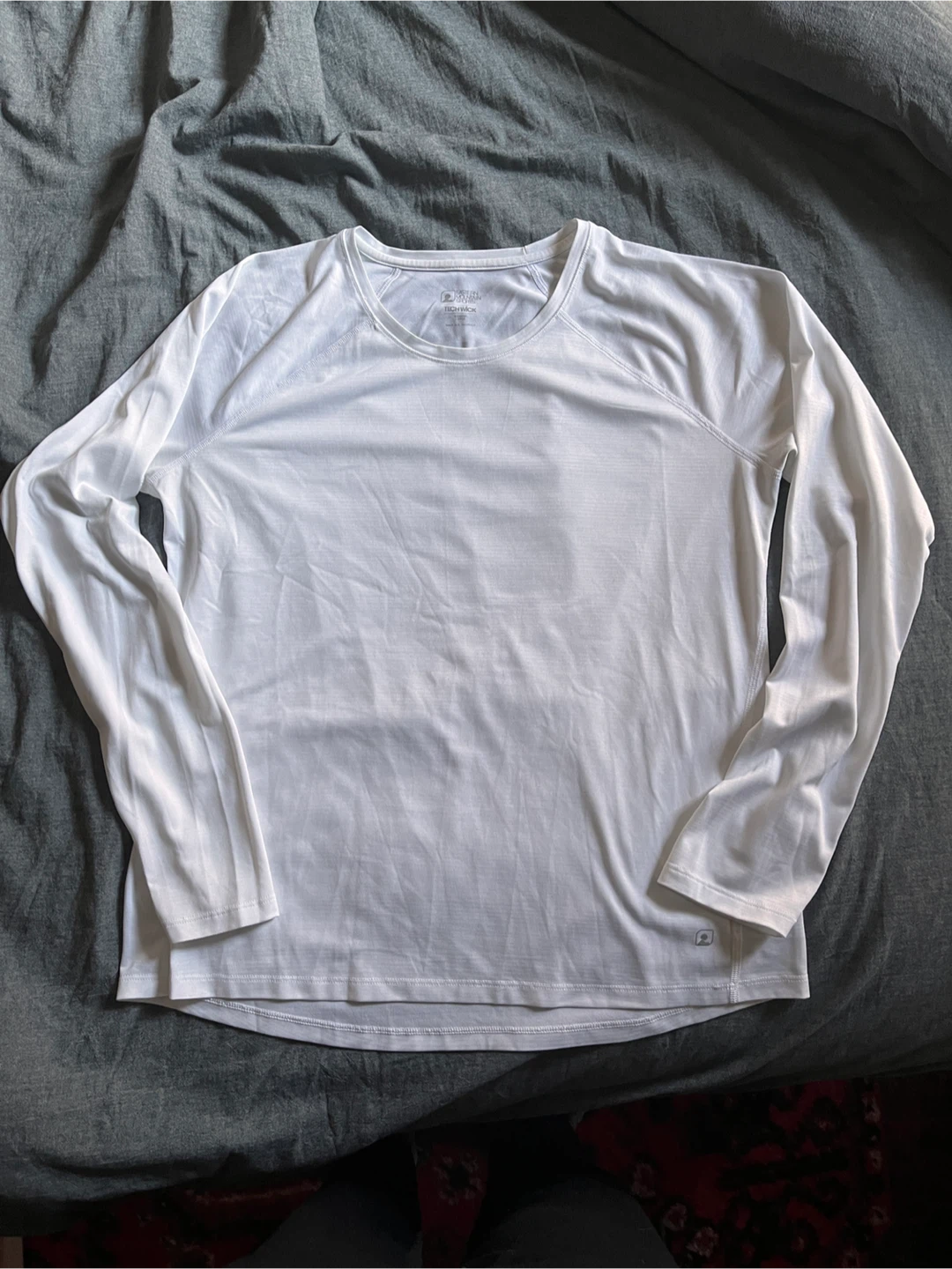 EMS white tech wick shirt, size L