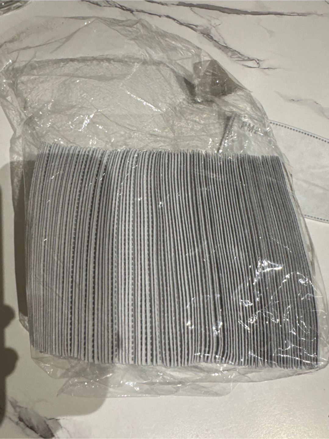 Adult PM2.5 Activated Carbon Filter Replacements - 100 Pack - photo 3