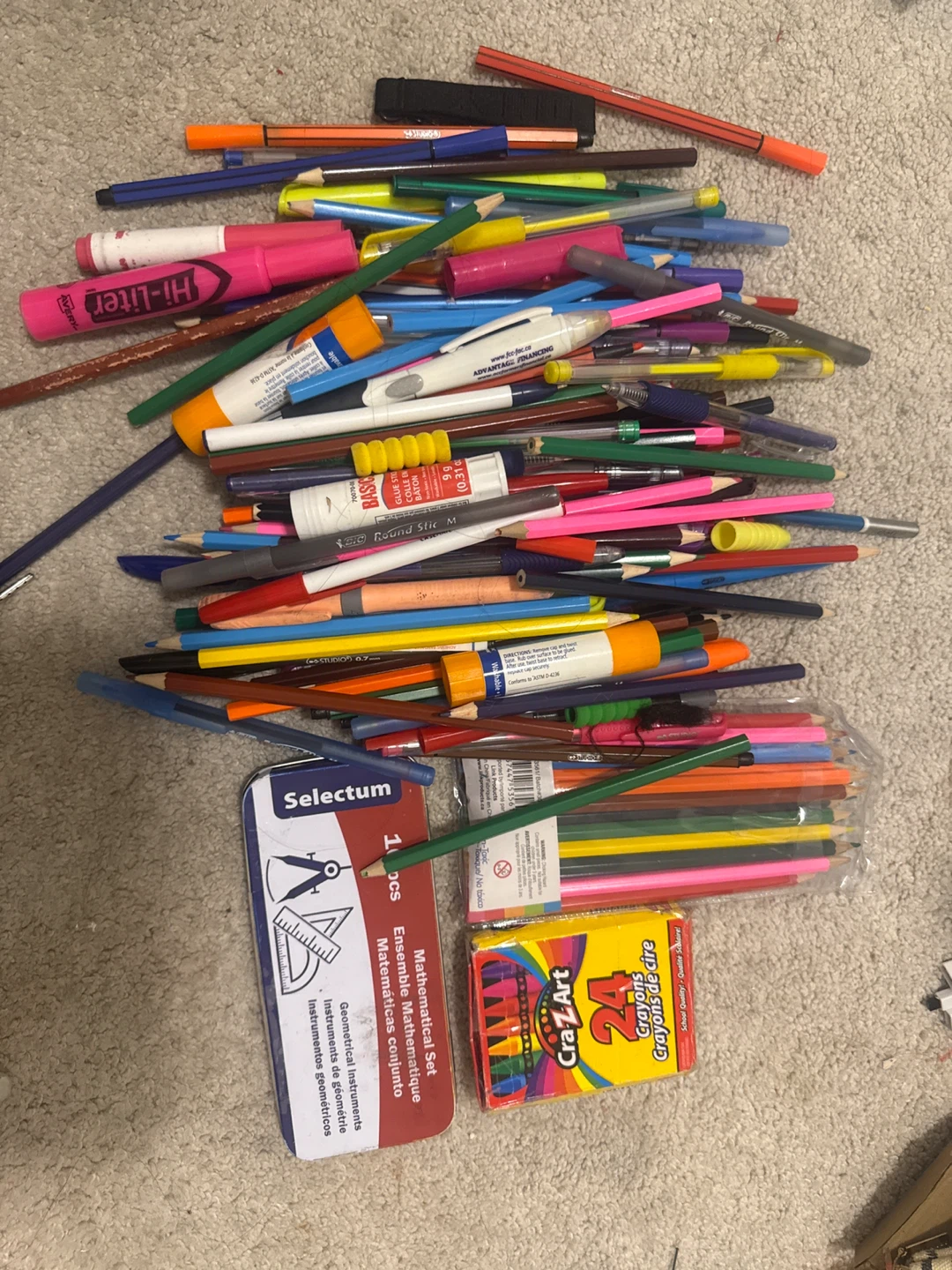 Assorted Pens, Pencils, Crayons, and Math Set