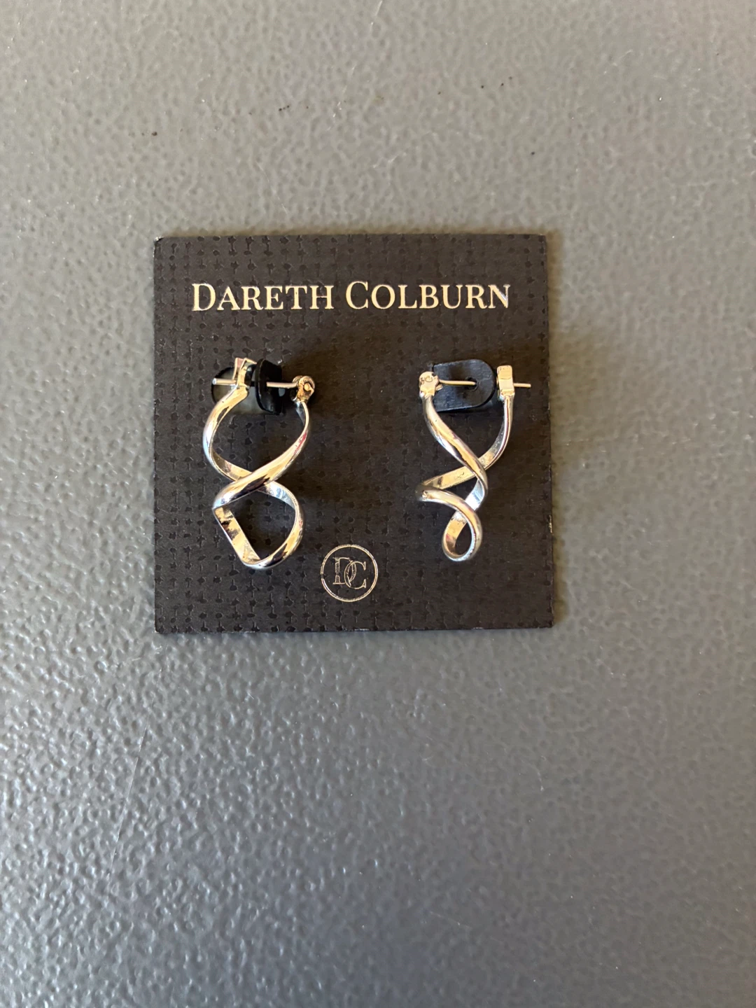 Dareth Colburn Silver Tone Swirl Hoop Earrings