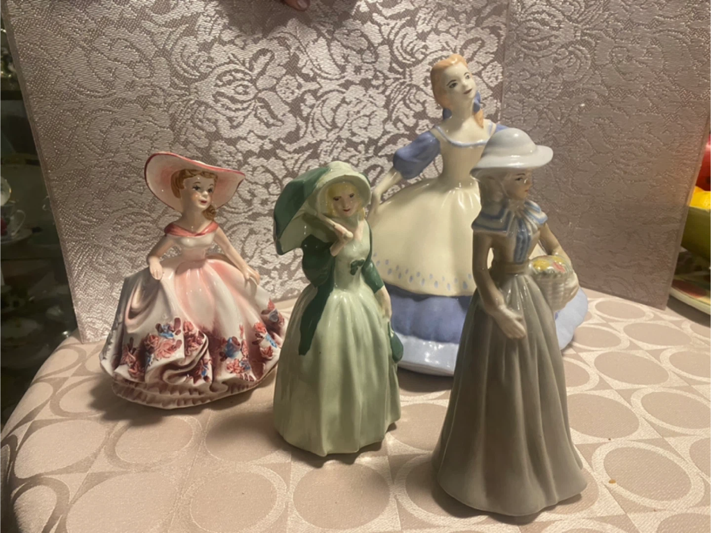 Collection of Four Ceramic Figurines