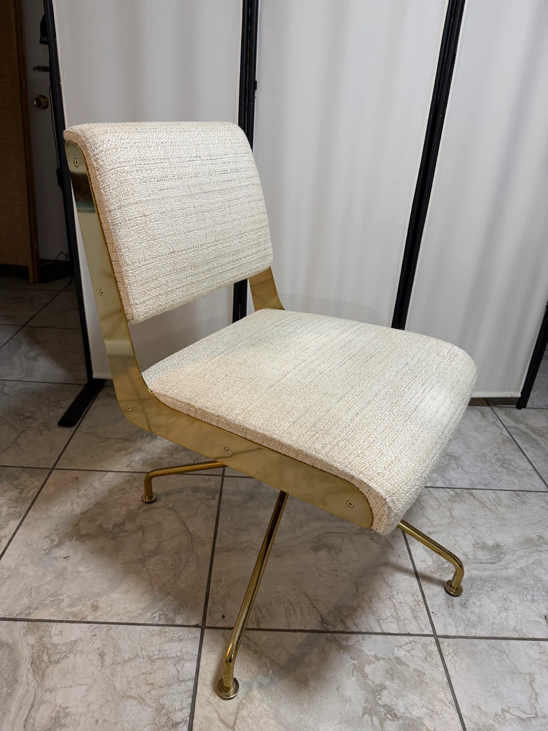 Cream Textured Upholstered Swivel Chair with Gold Base