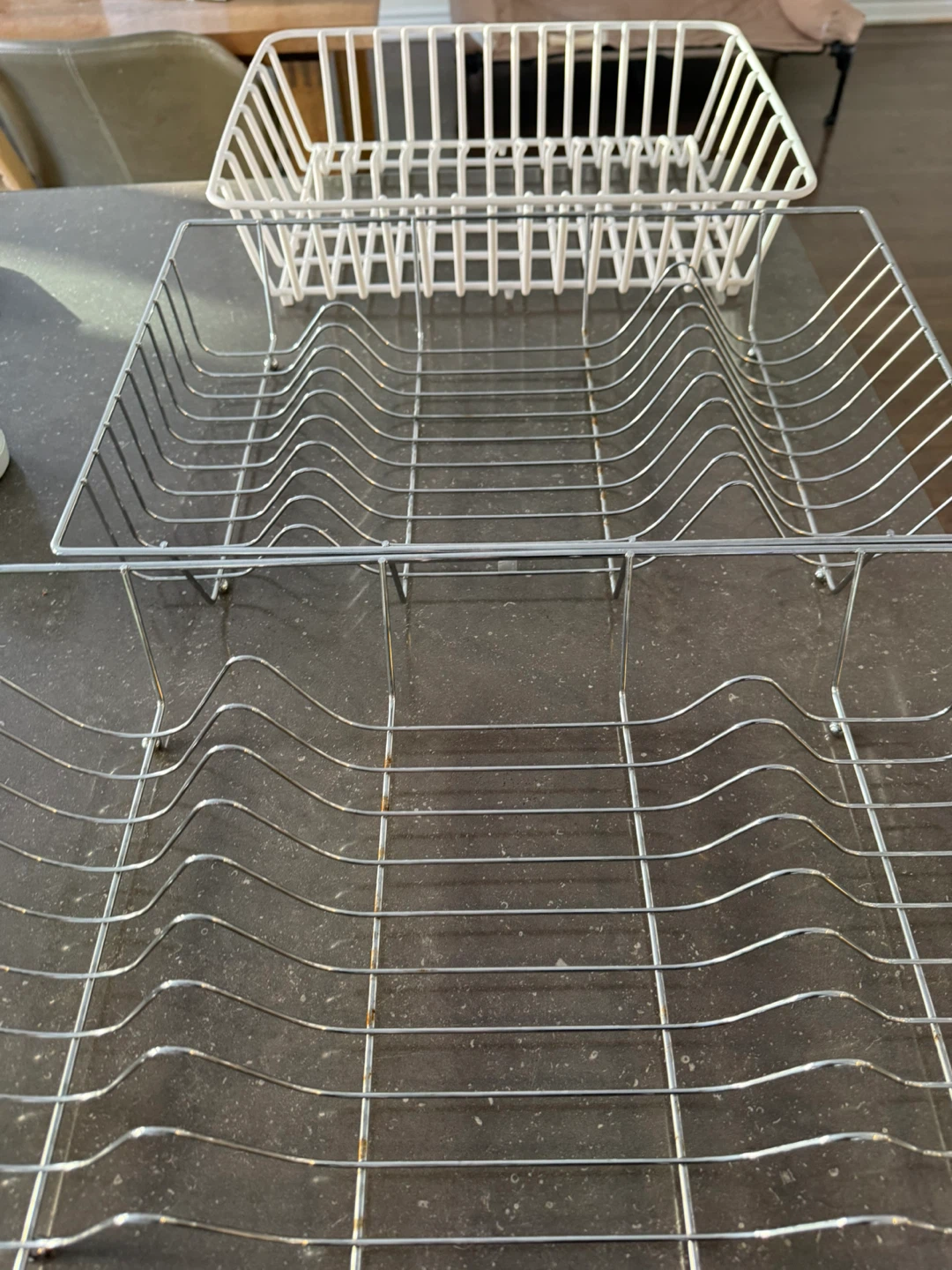 Two Metal and One White Plastic Dish Racks