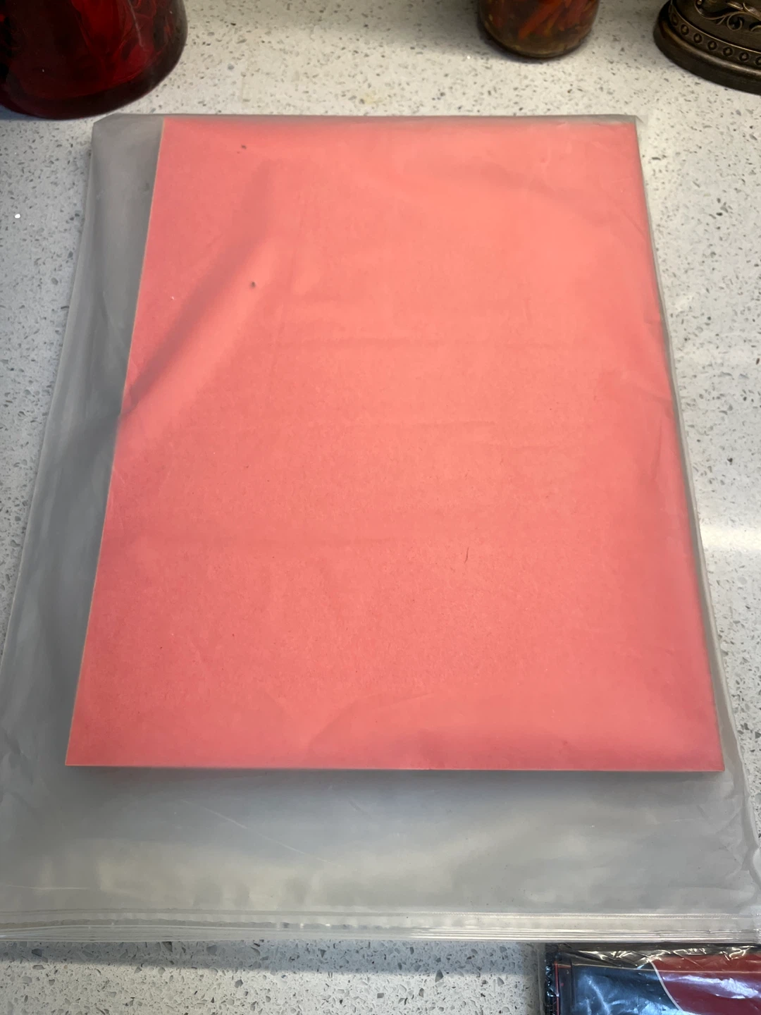 Coral coloured paper stack