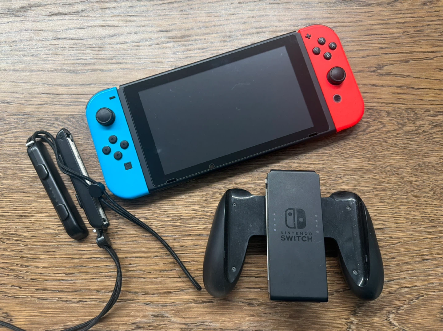 Nintendo Switch with Joy-Cons and accessories