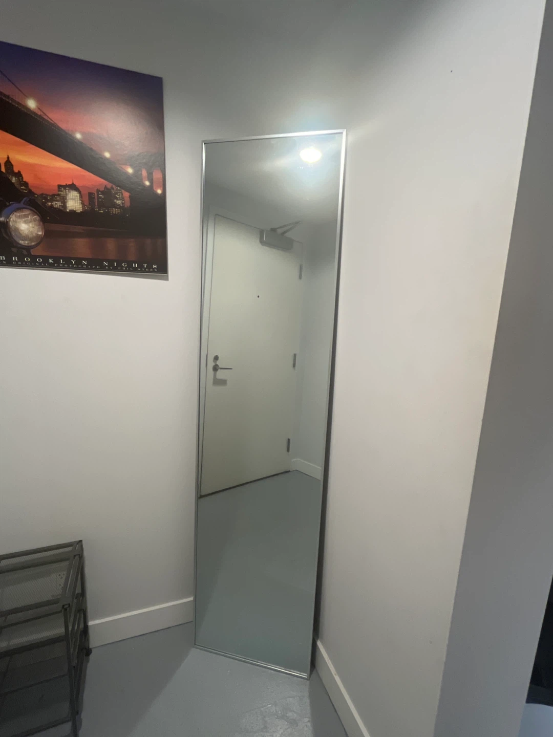 Full-length standing mirror with silver frame