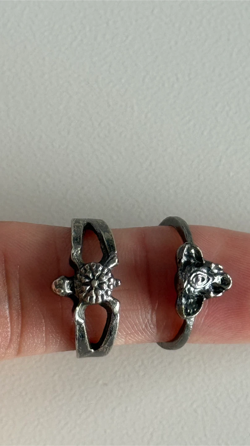 Two Unique Silver-Tone Rings size 4