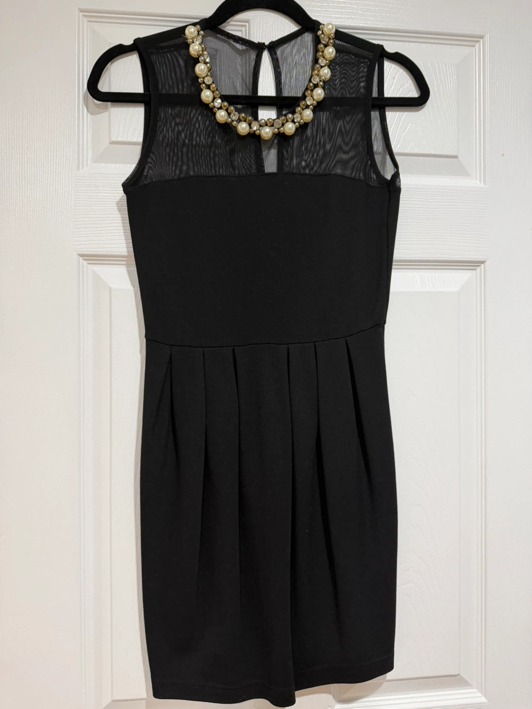 Black Sleeveless Dress with Embellished Mesh Neckline