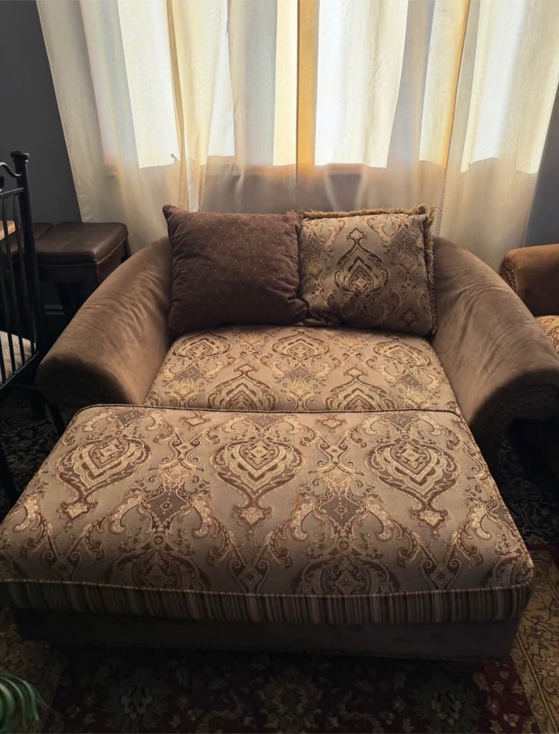 Brown Chaise Lounge with Ottoman and Patterned Cushions