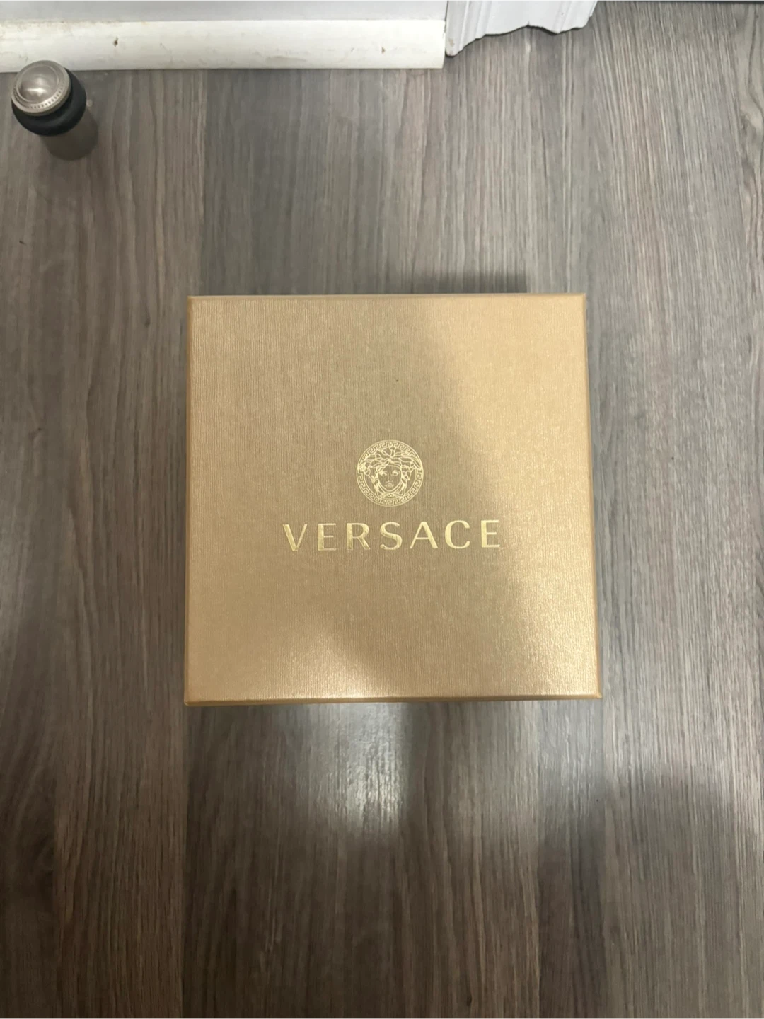 Versace Women's Gold Tone Watch with Black Face