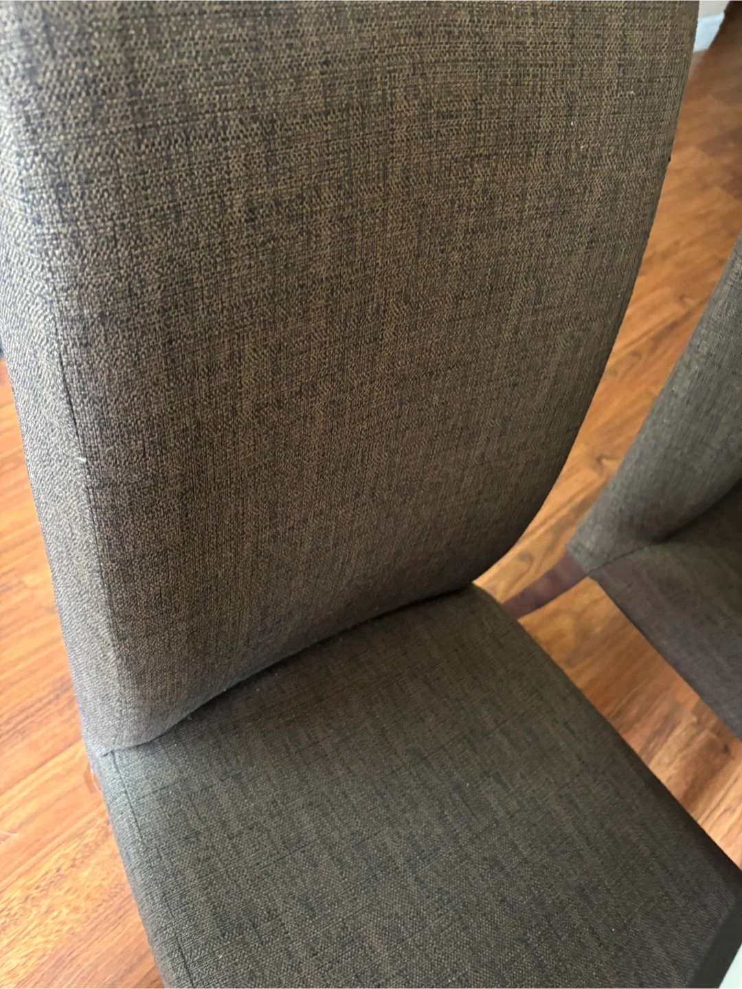 Four brown Upholstered Dining Chairs