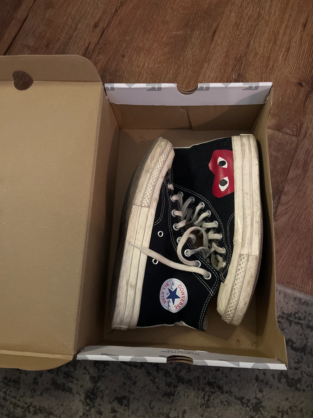 Comme des Garçons x Converse High Top Sneakers