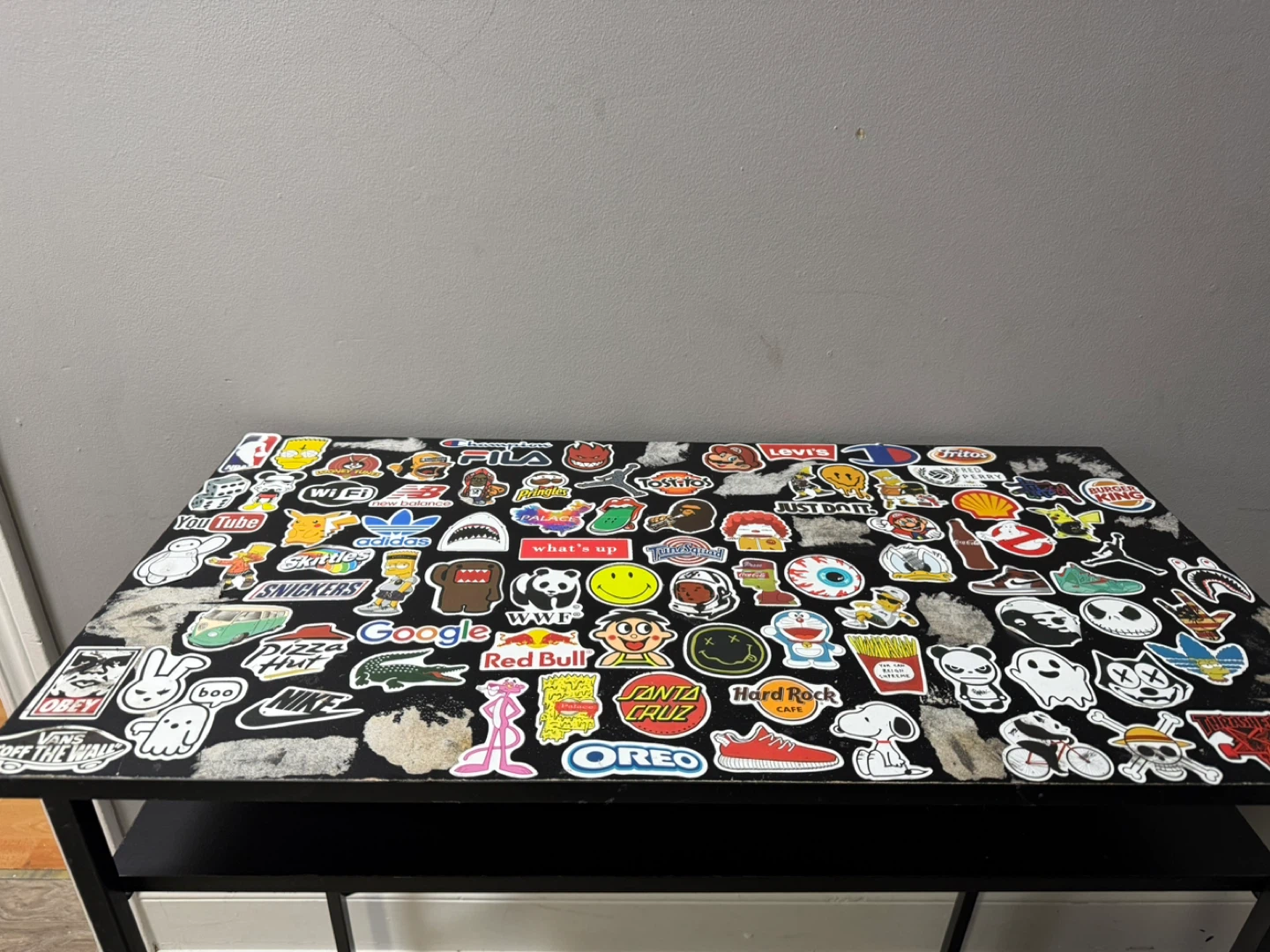 Sticker-Covered Black Desk with Shelf - photo 2